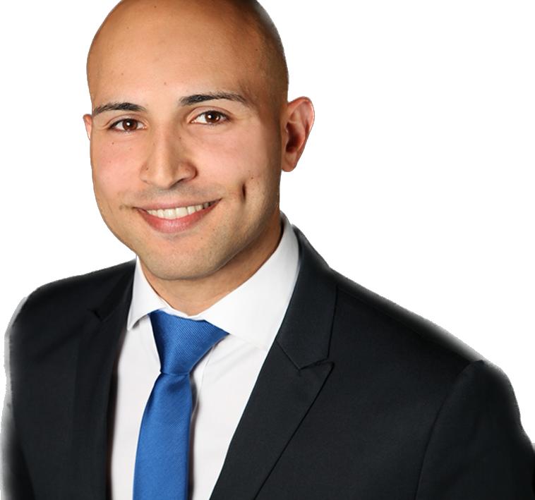 man standing in front of black background